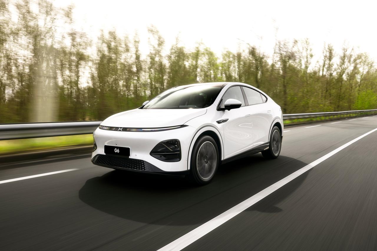 XPeng G6 electric SUV driving on highway